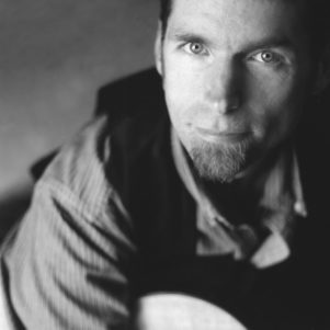 Black and white photo of Neil Bjorklund
